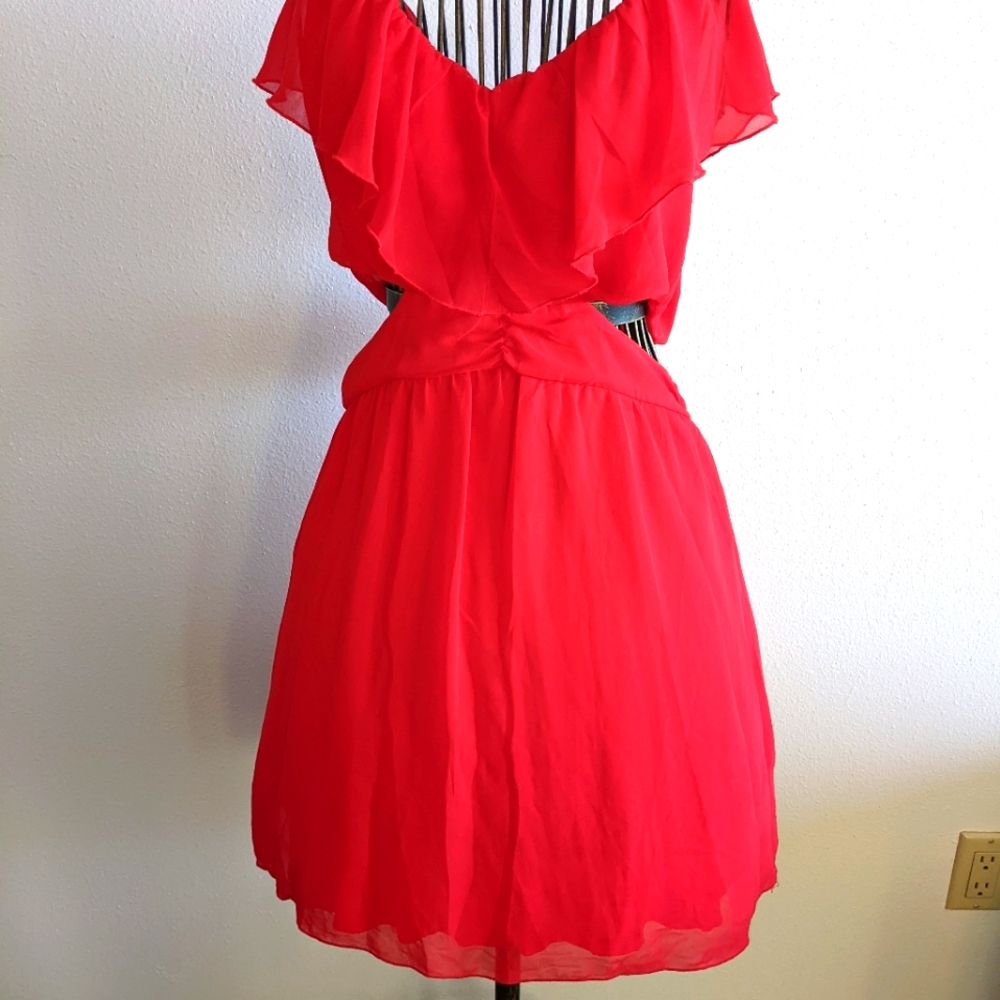 Cut-out mini dress by Accidentally in Love.